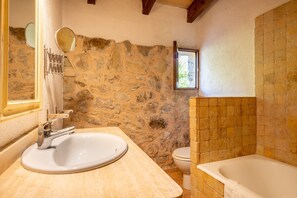 Bathtub, hair dryer, towels