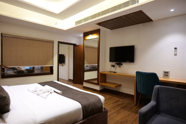 Classic Suite, 1 Bedroom, Balcony, Pool View | In-room safe, desk, iron/ironing board, free WiFi - The Emerald Grand (Dehradun)