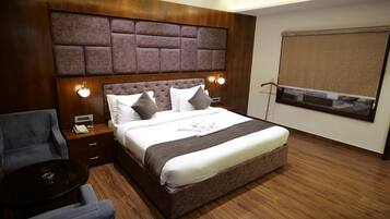 Classic Suite, 1 Bedroom, Balcony, Pool View | In-room safe, desk, iron/ironing board, free WiFi