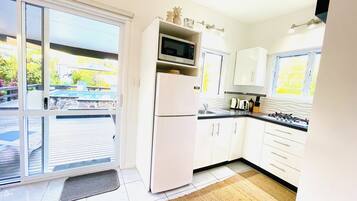 Fridge, microwave, coffee/tea maker, toaster