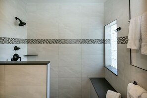 Shower, hair dryer, towels, soap
