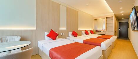 Family Triple Room, 1 Bedroom, Non Smoking, City View | Hypo-allergenic bedding, down comforters, individually furnished, desk