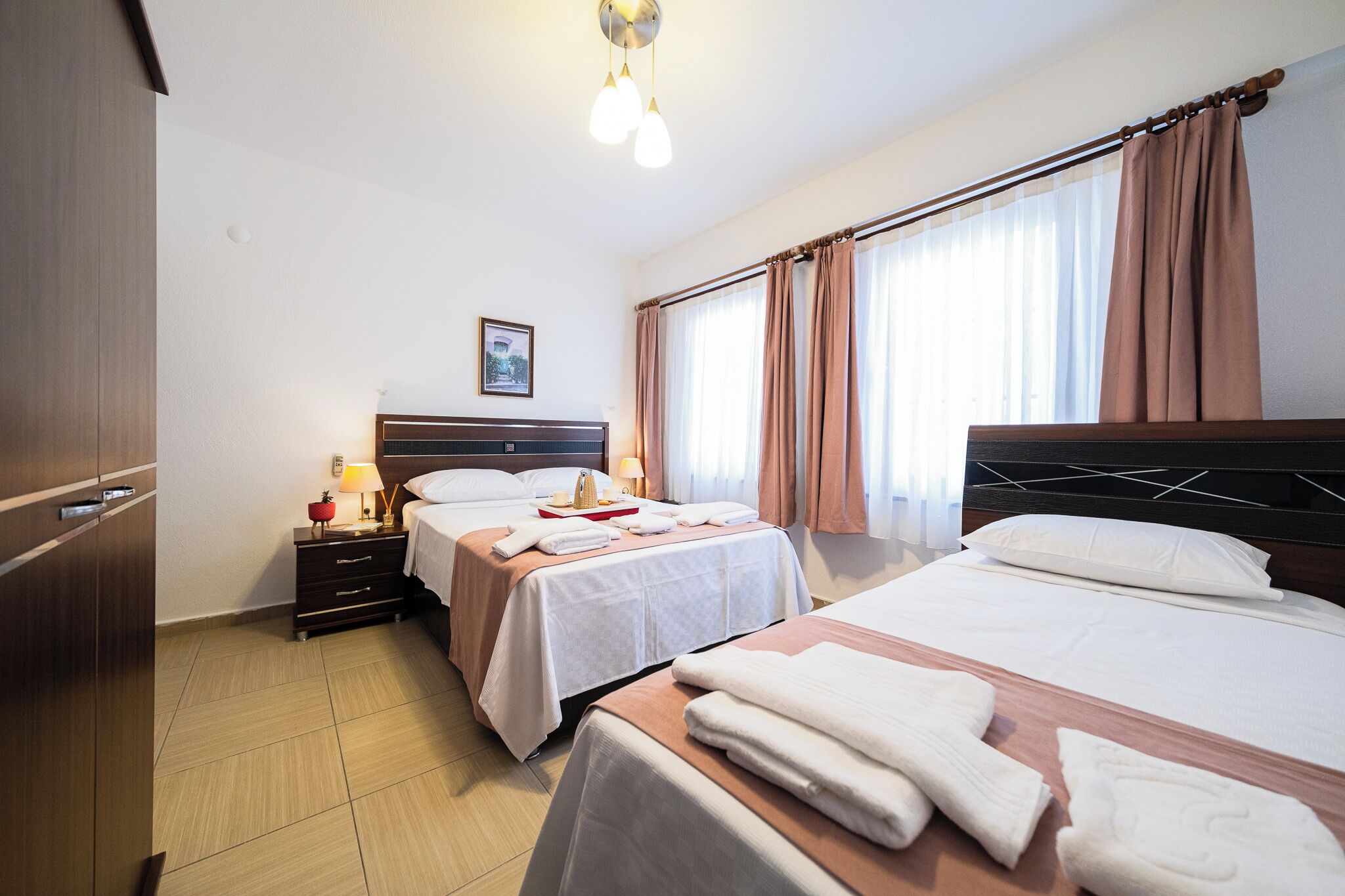deluxe room, multiple beds | free wifi, bed sheets