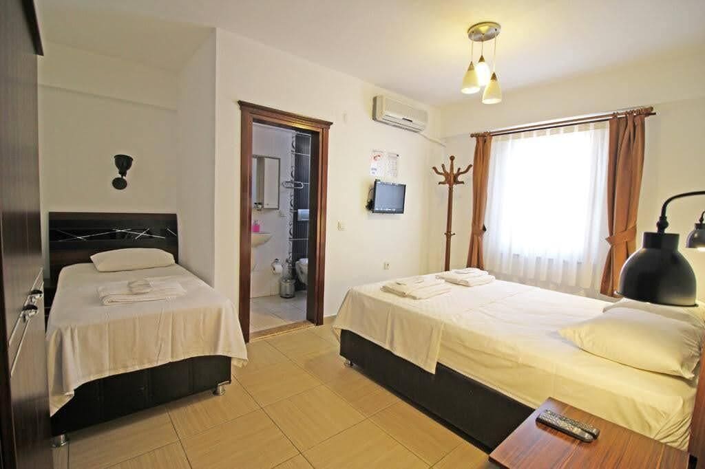 deluxe room, multiple beds | free wifi, bed sheets