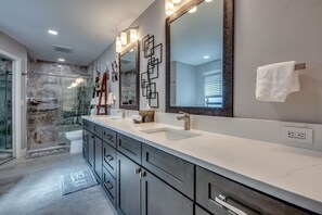 Bathtub, hair dryer, towels, soap