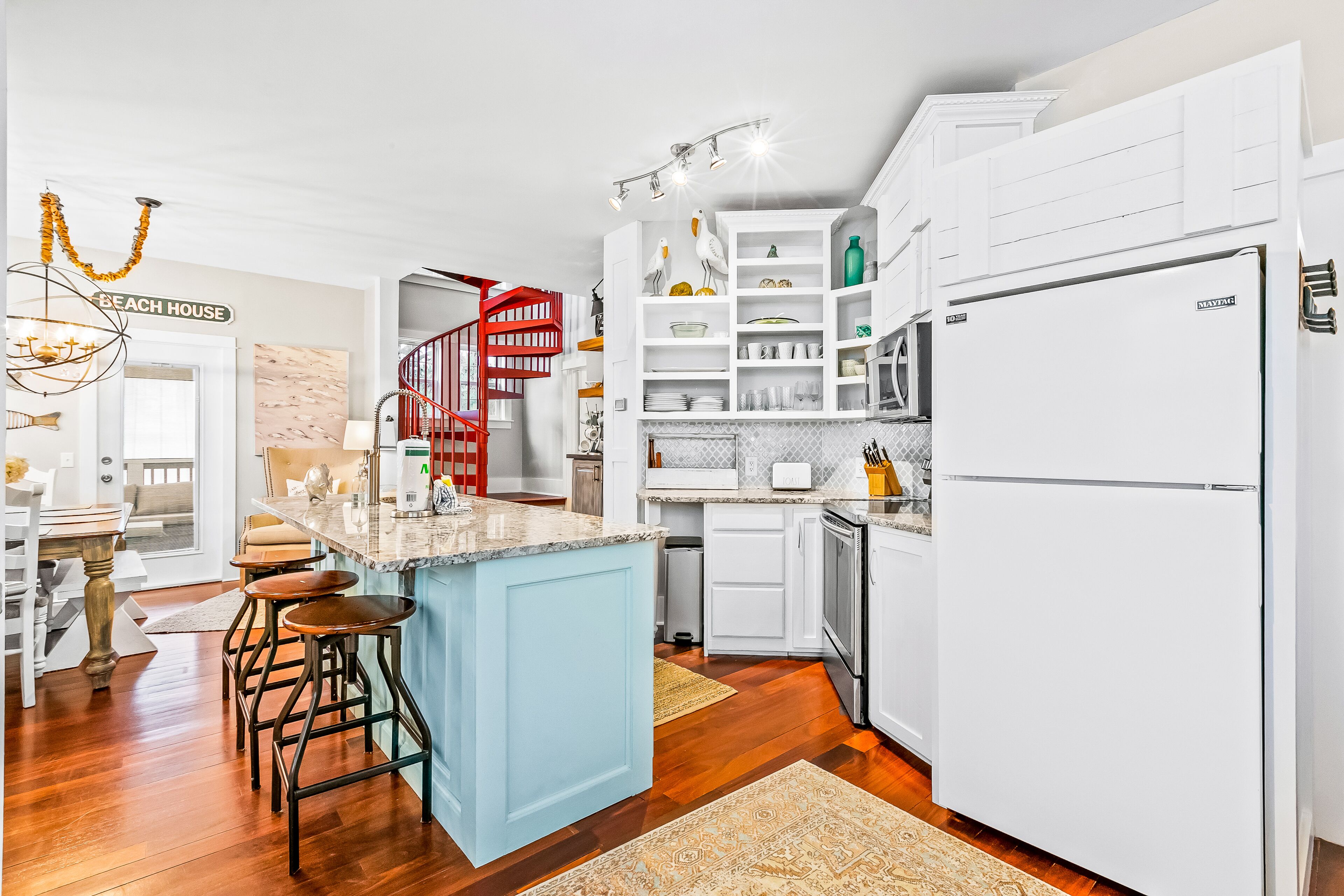 Beachy house with outdoor pool, golf cart, bikes, central AC, fast WiFi, & W/D