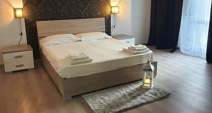 The apartment is located right in the city center. Parking available