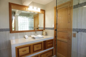 Bathtub, hair dryer, towels, soap