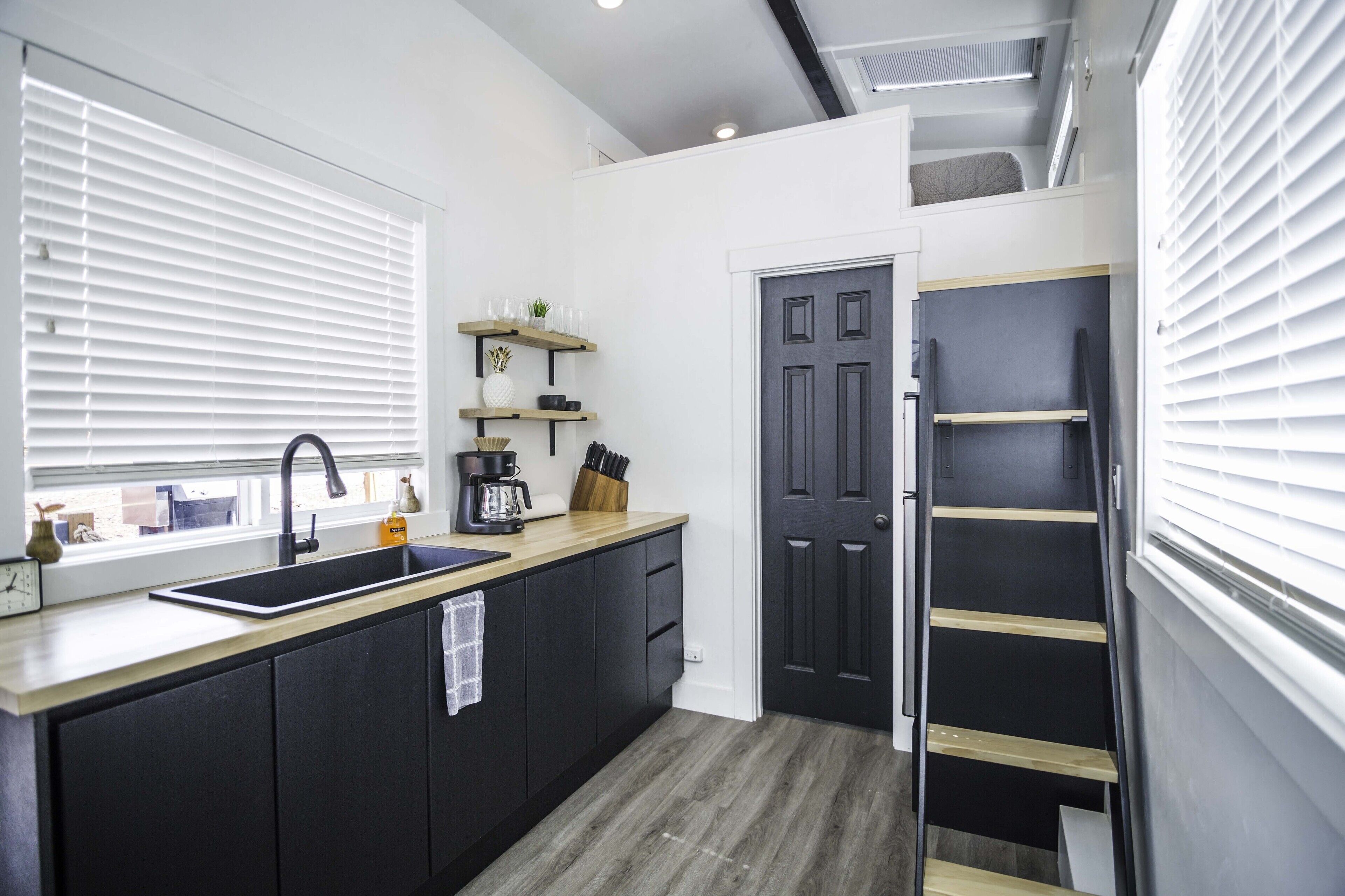 Fridge, microwave, coffee/tea maker, cookware/dishes/utensils