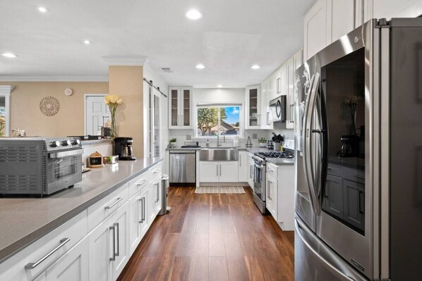 Fridge, microwave, oven, stovetop - Oasis House | Gated Pool+Spa (Indio)