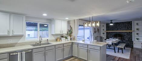 Coffee/tea maker, fridge, microwave, oven