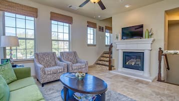 TV connectée, cheminée, jeux vidéo, livres