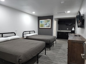 Room, 2 Queen Beds, Non Smoking (Efficiency) | Individually decorated, individually furnished, free WiFi, bed sheets