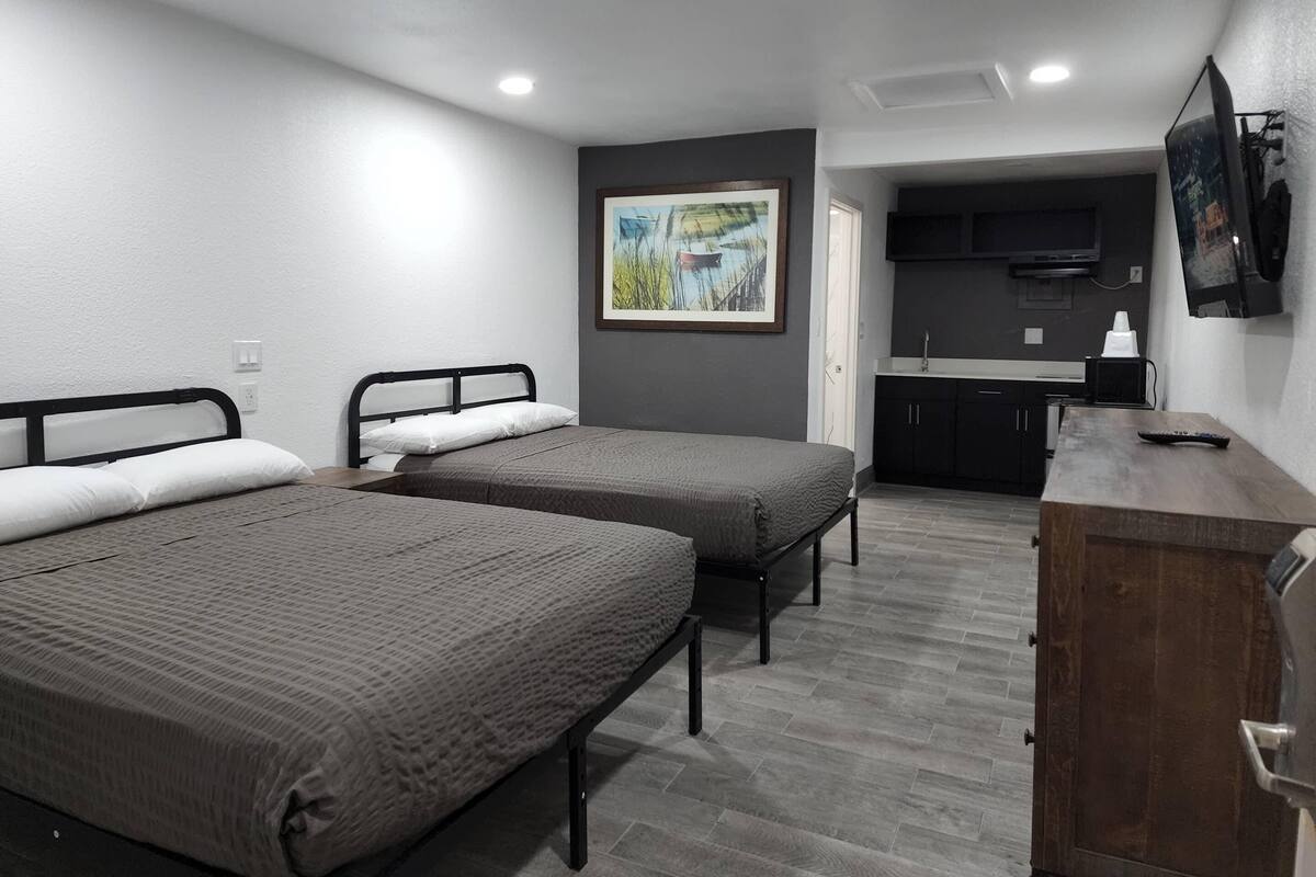 Room, 2 Queen Beds, Non Smoking (Efficiency) | Individually decorated, individually furnished, free WiFi, bed sheets