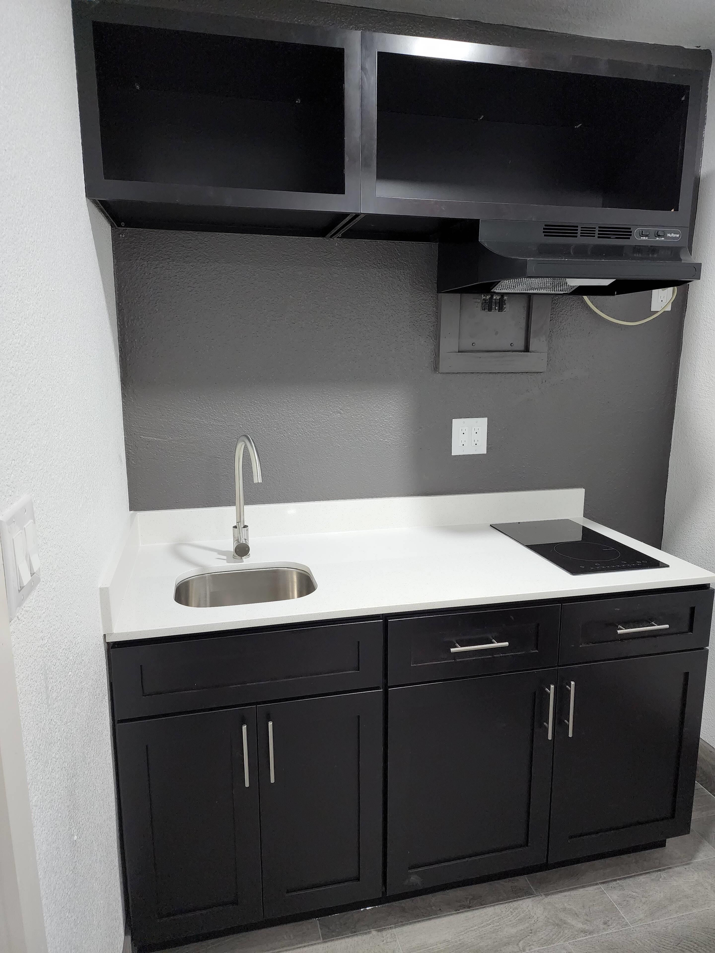 Room, 2 Queen Beds, Non Smoking (Efficiency) | Individually decorated, individually furnished, free WiFi, bed sheets