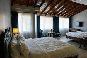 Habitación cuádruple familiar | Minibar, wifi gratis, ropa de cama