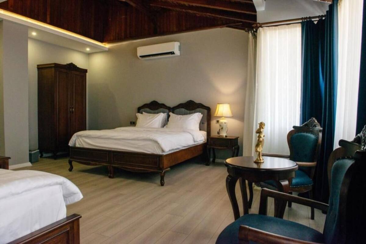 Habitación cuádruple familiar | Minibar, wifi gratis, ropa de cama