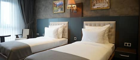 Egyptian cotton sheets, premium bedding, minibar, in-room safe