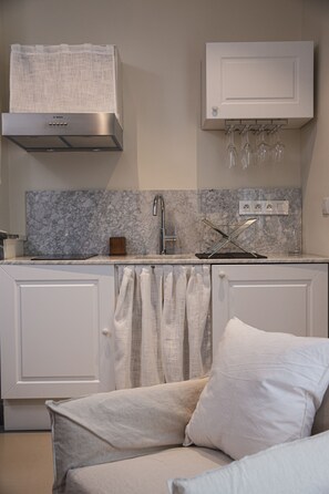 Appartamento Superior | Cucina privata | Mini-frigorifero, piano cottura, macchina per caffè espresso