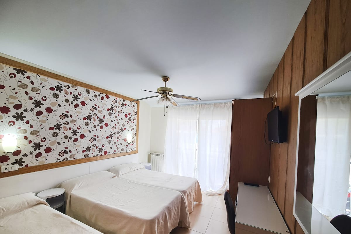 Individually furnished, desk, laptop workspace, blackout curtains