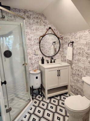 Shower, hair dryer, towels, soap