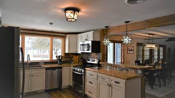 Microwave, dishwasher, coffee/tea maker, cookware/dishes/utensils