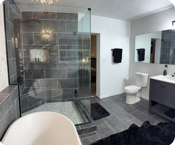 Bathtub, hair dryer, towels, soap