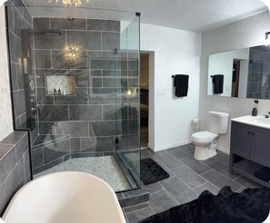 Bathtub, hair dryer, towels, soap