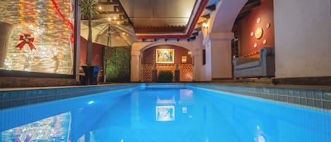 Outdoor pool, open 8:00 AM to 8:00 PM, sun loungers