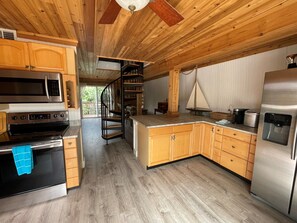 Fridge, microwave, oven, stovetop - Island Beach Barn - charming vacation house with bay/dock and beach access (Placida)