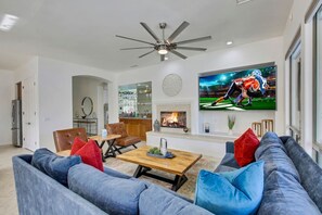 TV, fireplace - BACK IN BLACK/GOLIATH POOL (Indio)