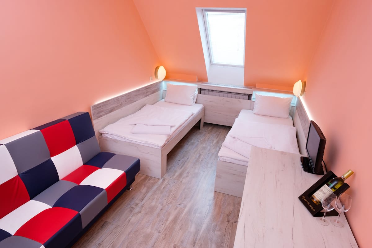 Doppel- oder Zweibettzimmer