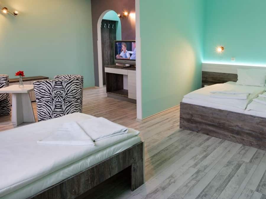 Quadruple Room | Minibar, desk, WiFi (free), individually decorated
