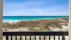 A beach view with clear turquoise water and sandy dunes. - π 3BR/3BA π Ground Floor @ Pinnacle Port βοΈ π 50 π©΄π©΄ to the sand (Panama City Beach)
