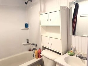 Combined shower/bathtub