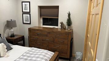 1 bedroom, blackout drapes, iron/ironing board, travel crib