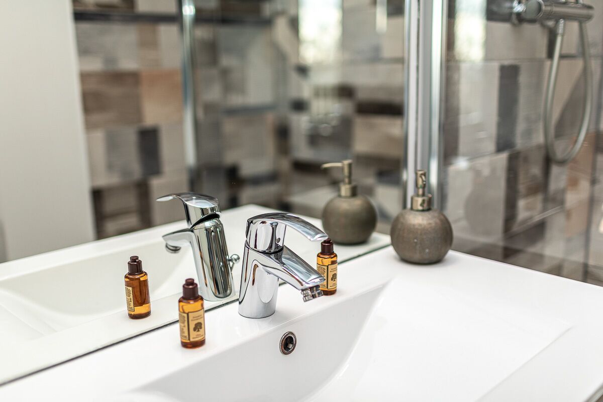 Shower, jetted bath, hair dryer, bathrobes
