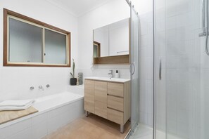 Bathtub, towels, soap