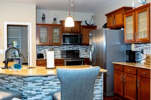 Fridge, microwave, oven, stovetop - Gorgeous Heated Pool Home Built in 2020 with Jacuzzi- 5.3 mi from INTL Airport…  (Jacksonville)