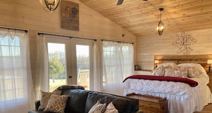 One room cabin set on our farm for a peaceful getaway.