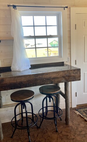 Dining - One room cabin set on our farm for a peaceful getaway. (Union Hall)
