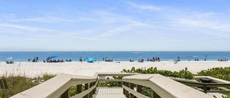 On the beach, sun-loungers, beach towels