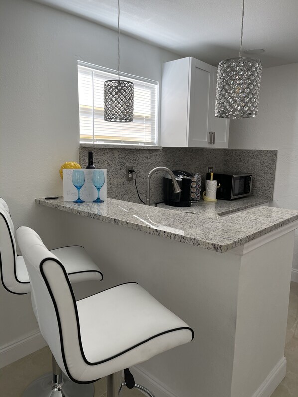 Fridge, microwave, coffee/tea maker, toaster