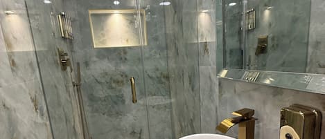Shower, bidet, towels, soap