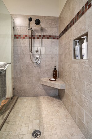 Combined shower/tub, hair dryer, towels, soap