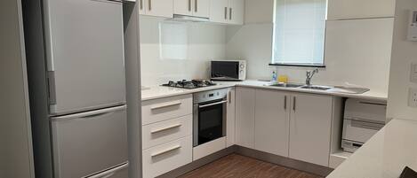 House | Private kitchen | Full-sized fridge, microwave, dishwasher, toaster