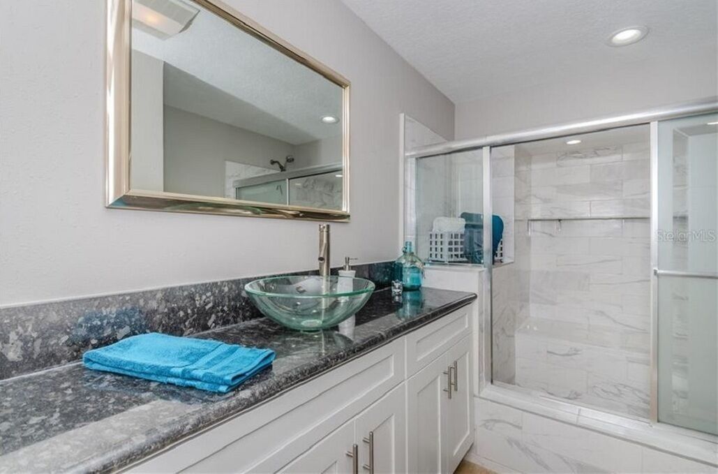 Bathtub, hair dryer, towels, soap