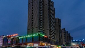 A high-rise hotel with multiple floors and a prominent entrance.