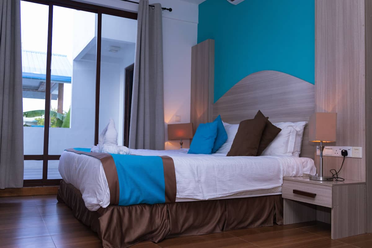 AC Deluxe Double Room | Premium bedding, down comforters, memory foam beds, desk