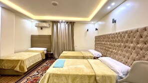 Deluxe trippelrum - 3 enkelsängar | Gratis wi-fi och sängkläder